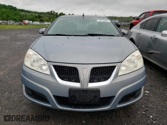 2009 Pontiac G6 1SB z VIN 1G2ZJ57B394251694, wystawiony jako Copart lot #56733065 z przebiegiem 210 351 mil mil oraz Szkoda całkowita • Salvage title. Historia ofert i sprzedaży dostępna na DreamBid. Obrazek 5.