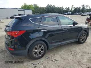2014 Hyundai Santa Fe with VIN 5XYZUDLBXEG198796, listed as a Copart auction lot 56596375 with 106,017 mi miles and Salvage title. Bid and sale history available at DreamBid. Image 3.