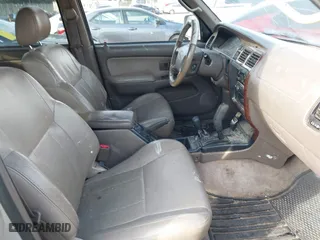 1998 Toyota 4Runner Limited with VIN JT3HN87R6W0137495, listed as a IAAI auction lot 41652722 with 322,165 mi miles. Bid and sale history available at carsss.com. Image 5.