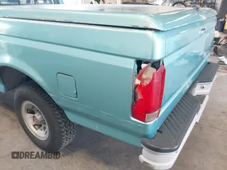 1994 Ford F-150 Special with VIN 1FTEF15N4RLA40379, listed as a IAAI auction lot 41809241 with 173,537 mi miles. Bid and sale history available at carsss.com. Image 6.