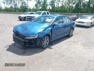 2015 Volkswagen Jetta Sport with VIN 3VWD17AJ9FM297822, listed as a IAAI auction lot 42621800 with 99,966 mi miles and . Bid and sale history available at DreamBid. Image 2.