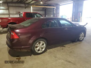 2012 Ford Fusion SE with VIN 3FAHP0HA0CR377773, listed as a Copart auction lot 57278885 with 133,700 mi miles and Salvage title. Bid and sale history available at DreamBid. Image 3.