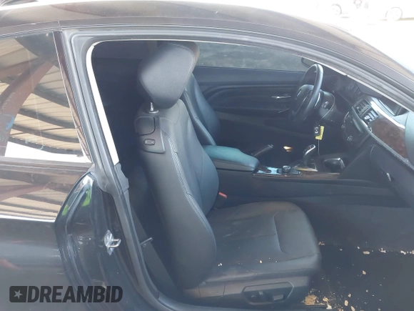2015 BMW 4 Series 428i with VIN WBA3N3C55FK232613, listed as a IAAI auction lot 41865898 with 104,585 mi miles and . Bid and sale history available at carsss.com. Image 5.