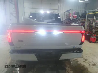 2023 Ford F-150 Lightning Pro с VIN 1FT6W1EV6PWG14545, выставлен на аукционе IAAI как лот 42065698 с пробегом 18 882 миль миль и . История ставок и продаж доступна на DreamBid. Изображение 16.