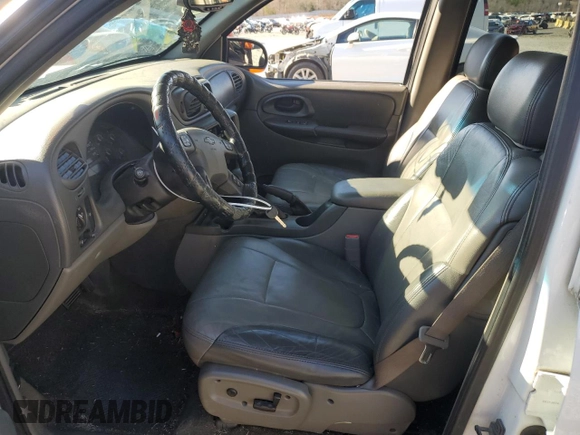 2003 Chevrolet TrailBlazer LTZ with VIN 1GNDT13S832260691, listed as a Copart auction lot 85911284 with 140,993 mi miles and Salvage Title. Bid and sale history available at DreamBid. Image 7.