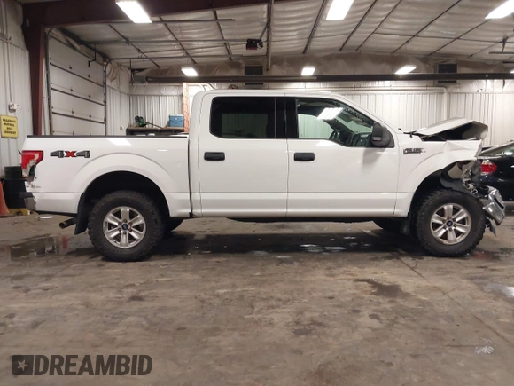 2015 Ford F-150 XLT with VIN 1FTEW1EF2FKF21984, listed as a IAAI auction lot 42385273 with 103,721 mi miles and . Bid and sale history available at DreamBid. Image 14.