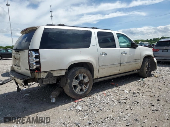 2010 Chevrolet Suburban LTZ with VIN 1GNUKKE33AR172523, listed as a Copart auction lot 54595654 with 228,705 mi miles and Salvage Title. Bid and sale history available at carsss.com. Image 3.