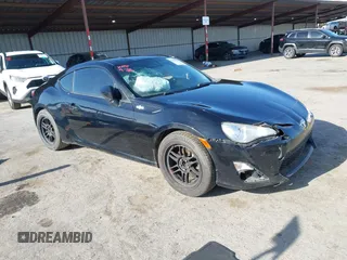 2014 Scion FR-S z VIN JF1ZNAA11E8702526, wystawiony jako IAAI lot #42068499 z przebiegiem 79 312 mil mil oraz . Historia ofert i sprzedaży dostępna na DreamBid. Obrazek 1.