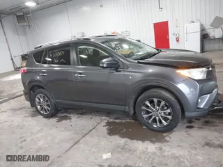 2018 Toyota RAV4 Limited with VIN JTMDFREV7JJ212799, listed as a IAAI auction lot 41202854 with 120,705 mi miles. Bid and sale history available at carsss.com. Image 13.