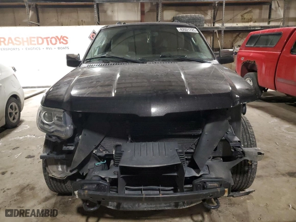 2015 Lincoln Navigator with VIN 5LMJJ2JT4FEJ14755, listed as a Copart auction lot 42021725 with 72,711 mi miles and Salvage Title. Bid and sale history available at carsss.com. Image 5.