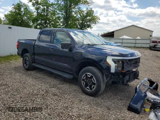 2022 Ford F-150 Lightning Pro z VIN 1FTVW1EL6NWG04931, wystawiony jako Copart lot #59096435 z przebiegiem 26 616 mil mil oraz Szkody całkowita. Historia ofert i sprzedaży dostępna na DreamBid. Obrazek 4.