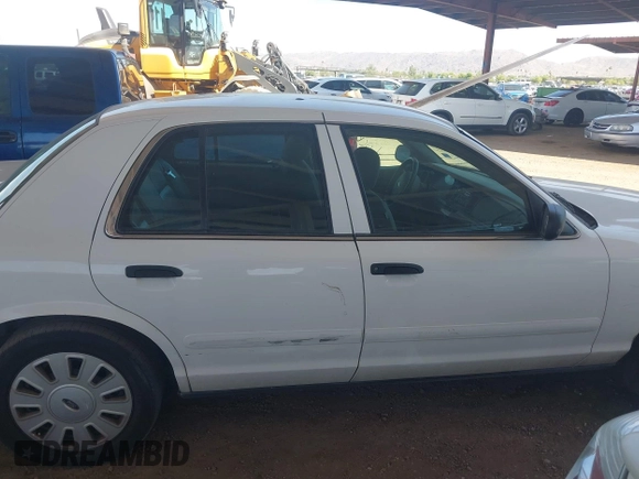 2006 Ford Police Interceptor z VIN 2FAHP71W26X142764, wystawiony jako IAAI lot #42387490 z przebiegiem Nie podano mil oraz . Historia ofert i sprzedaży dostępna na DreamBid. Obrazek 13.
