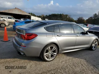 2013 BMW 5 Series with VIN WBASP0C59DC987937, listed as a Copart auction lot 84171054 with 115,522 mi miles and Salvage title. Bid and sale history available at DreamBid. Image 3.