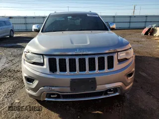 2015 Jeep Grand Cherokee Overland with VIN 1C4RJFCT8FC619014, listed as a Copart auction lot 44304375 with 123,767 mi miles and Salvage Title. Bid and sale history available at carsss.com. Image 5.