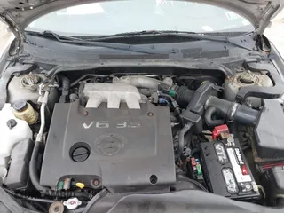 2005 Nissan Altima SE with VIN 1N4BL11E65C133566, listed as a IAAI auction lot 41792300 with 169,733 mi miles. Bid and sale history available at carsss.com. Image 10.