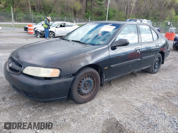 2001 Nissan Altima GXE with VIN 1N4DL01D51C201747, listed as a IAAI auction lot 41970911 with 294,383 mi miles. Bid and sale history available at carsss.com. Image 2.