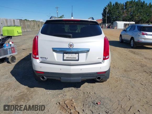 2013 Cadillac SRX Performance Collection with VIN 3GYFNHE31DS597987, listed as a IAAI auction lot 42319058 with 139,670 mi miles and . Bid and sale history available at DreamBid. Image 16.