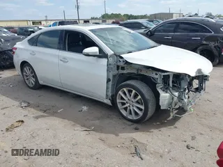 2014 Toyota Avalon Limited with VIN 4T1BK1EB0EU127927, listed as a IAAI auction lot 41765527 with 158,077 mi miles. Bid and sale history available at carsss.com. Image 1.