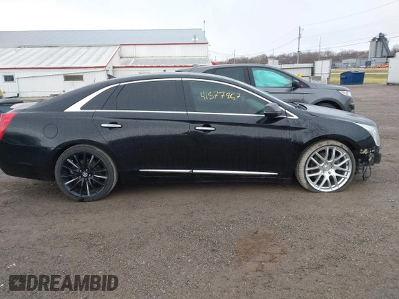 2014 Cadillac XTS Platinum with VIN 2G61W5S84E9291640, listed as a IAAI auction lot 41877867 with 100,462 mi miles and . Bid and sale history available at DreamBid. Image 13.