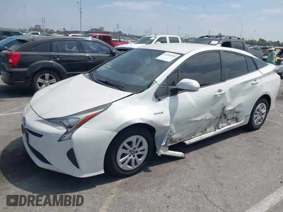 2016 Toyota Prius Two z VIN JTDKBRFU3G3024092, wystawiony jako IAAI lot #42338381 z przebiegiem 87 216 mil mil oraz . Historia ofert i sprzedaży dostępna na DreamBid. Obrazek 2.