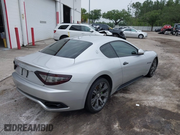 2013 Maserati GranTurismo Sport with VIN ZAM45VLA8D0072490, listed as a IAAI auction lot 42438872 with 84,214 mi miles and . Bid and sale history available at DreamBid. Image 4.