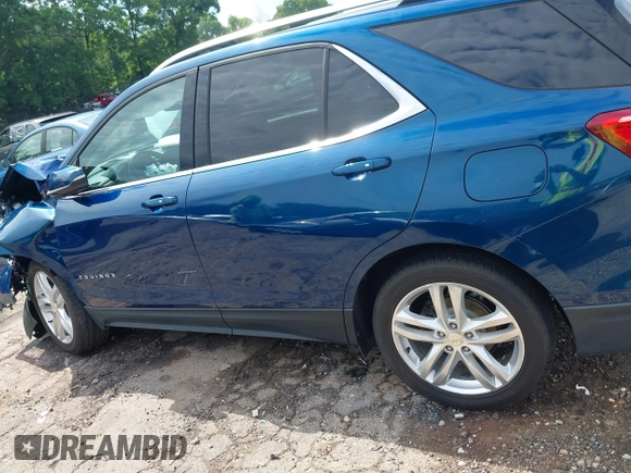 2019 Chevrolet Equinox LT z VIN 3GNAXUEV4KL149570, wystawiony jako IAAI lot #42250214 z przebiegiem 79 743 mil mil oraz . Historia ofert i sprzedaży dostępna na DreamBid. Obrazek 14.