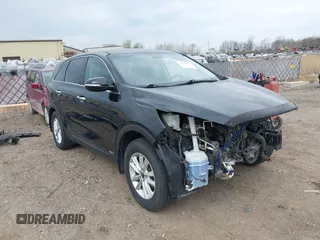 2019 Kia Sorento LX z VIN 5XYPGDA37KG574957, wystawiony jako IAAI lot #42086852 z przebiegiem 79 496 mil mil oraz . Historia ofert i sprzedaży dostępna na DreamBid. Obrazek 1.