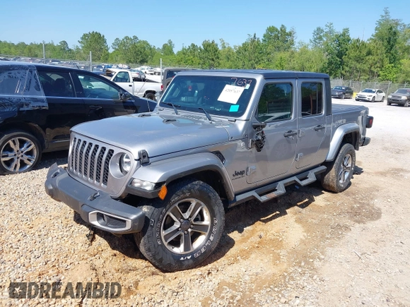 2021 Jeep Gladiator Willys z VIN 1C6HJTAG6ML507039, wystawiony jako IAAI lot #42057637 z przebiegiem 69 443 mil mil oraz . Historia ofert i sprzedaży dostępna na DreamBid. Obrazek 2.