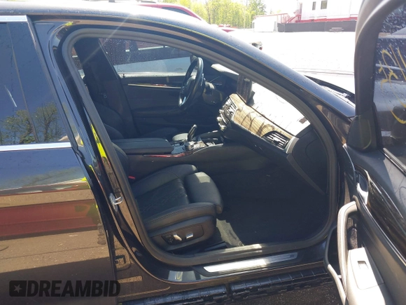 2021 BMW 5 Series 530i xDrive with VIN WBA13BJ0XMWX00677, listed as a IAAI auction lot 42100435 with 66,140 mi miles and . Bid and sale history available at DreamBid. Image 5.