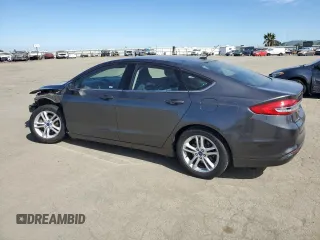 2018 Ford Fusion SE with VIN 3FA6P0HD8JR218806, listed as a Copart auction lot 47457205 with 128,452 mi miles and Salvage Title. Bid and sale history available at carsss.com. Image 2.