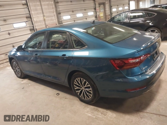 2019 Volkswagen Jetta SEL z VIN 3VWE57BU2KM116717, wystawiony jako IAAI lot #41951428 z przebiegiem 85 791 mil mil oraz . Historia ofert i sprzedaży dostępna na DreamBid. Obrazek 14.