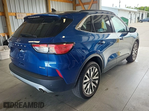 2022 Ford Escape Titanium with VIN 1FMCU9J97NUA64891, listed as a IAAI auction lot 42733833 with 88,884 mi miles and . Bid and sale history available at DreamBid. Image 22.