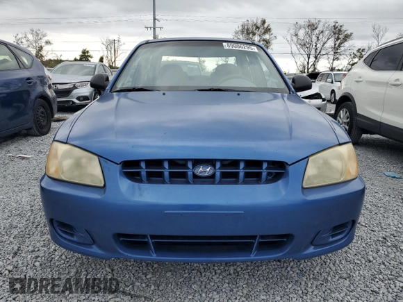 2002 Hyundai Accent GL with VIN KMHCG45C82U355914, listed as a Copart auction lot 89006295 with 60,907 mi miles and Clean Title. Bid and sale history available at carsss.com. Image 5.