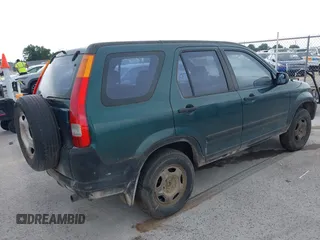 2003 Honda CR-V LX z VIN JHLRD68433C009318, wystawiony jako IAAI lot #42188300 z przebiegiem 265 917 mil mil oraz . Historia ofert i sprzedaży dostępna na DreamBid. Obrazek 4.
