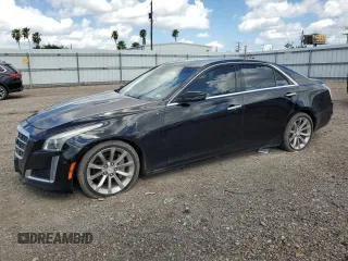 2014 Cadillac CTS Performance RWD with VIN 1G6AS5S33E0130965, listed as a Copart auction lot 60669564 with 28,435 mi miles and Salvage Title. Bid and sale history available at DreamBid. Image 1.