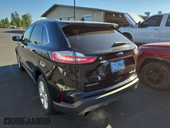 2020 Ford Edge Titanium with VIN 2FMPK3K99LBA73839, listed as a IAAI auction lot 42843885 with 92,381 mi miles and . Bid and sale history available at DreamBid. Image 29.
