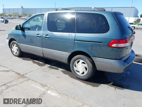 2002 Toyota Sienna LE with VIN 4T3ZF13C02U442678, listed as a IAAI auction lot 42241435 with 218,501 mi miles and . Bid and sale history available at DreamBid. Image 3.