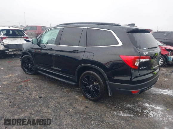 2021 Honda Pilot Special Edition with VIN 5FNYF6H29MB002461, listed as a IAAI auction lot 41501013 with 58,187 mi miles. Bid and sale history available at carsss.com. Image 3.
