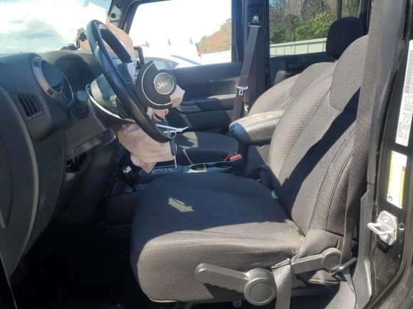 2017 Jeep Wrangler Unlimited Sport with VIN 1C4HJWDG8HL744823, listed as a Copart auction lot 65827465 with 51,859 mi miles and Salvage title. Bid and sale history available at DreamBid. Image 7.