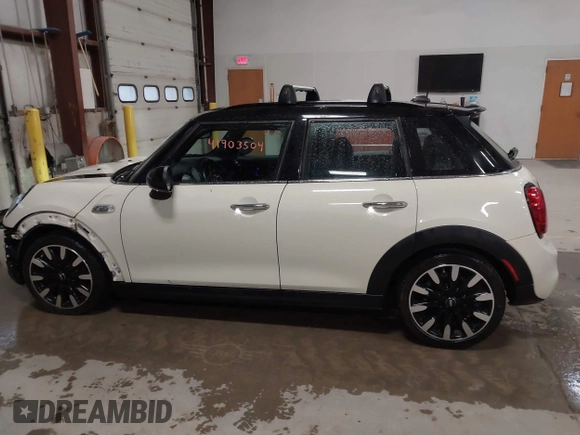 2019 MINI Hardtop 4 Door Cooper S with VIN WMWXU3C5XK2H88000, listed as a IAAI auction lot 41903504 with 60,245 mi miles and . Bid and sale history available at DreamBid. Image 15.