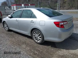 2013 Toyota Camry L with VIN 4T4BF1FK8DR308815, listed as a IAAI auction lot 41861568 with 157,959 mi miles. Bid and sale history available at carsss.com. Image 3.
