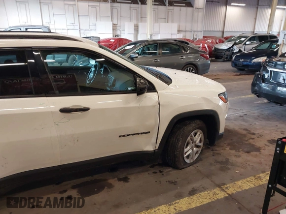 2018 Jeep Compass Sport with VIN 3C4NJCAB6JT124198, listed as a IAAI auction lot 41192196 with 104,557 mi miles. Bid and sale history available at carsss.com. Image 17.