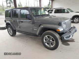 2019 Jeep Wrangler Unlimited Sahara with VIN 1C4HJXEN0KW540591, listed as a IAAI auction lot 42076235 with 41,016 mi miles and . Bid and sale history available at DreamBid. Image 1.