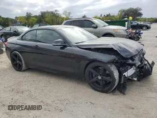 2015 BMW 4 Series 435i with VIN WBA3T3C59FP738972, listed as a Copart auction lot 50323265 with 131,982 mi miles and Salvage Title. Bid and sale history available at carsss.com. Image 4.
