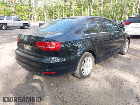 2015 Volkswagen Jetta SE z VIN 3VWD07AJ1FM277499, wystawiony jako IAAI lot #42085122 z przebiegiem 122 754 mil mil oraz . Historia ofert i sprzedaży dostępna na DreamBid. Obrazek 4.