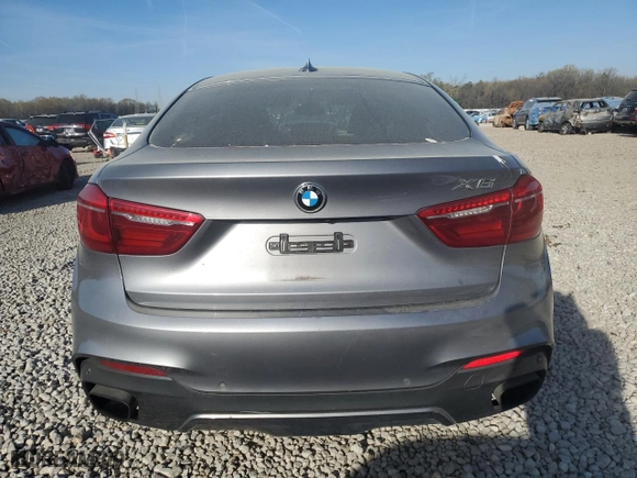 2016 BMW X6 xDrive50i with VIN 5UXKU6C57G0R33958, listed as a Copart auction lot 49774065 with 124,226 mi miles and Salvage Title. Bid and sale history available at carsss.com. Image 6.
