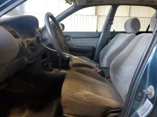 1995 Toyota Corolla DX с VIN 2T1AE09B9SC116574, выставлен на аукционе Copart как лот 61986565 с пробегом 189 044 миль миль и Списание • Salvage title. История ставок и продаж доступна на DreamBid. Изображение 7.