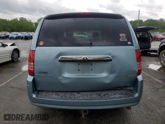 2010 Chrysler Town & Country Touring with VIN 2A4RR5D19AR170145, listed as a Copart auction lot 54665135 with 184,351 mi miles and Salvage Title. Bid and sale history available at DreamBid. Image 6.