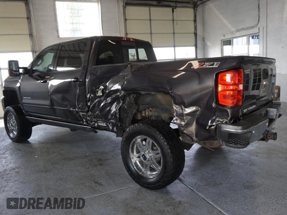 2015 Chevrolet Silverado 3500HD LT with VIN 1GC4KZC84FF595989, listed as a Copart auction lot 70707104 with 96,817 mi miles and Salvage Title. Bid and sale history available at carsss.com. Image 4.