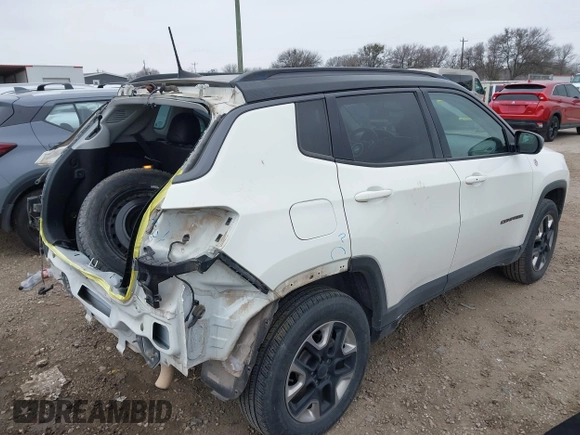2018 Jeep Compass Trailhawk with VIN 3C4NJDDB7JT144431, listed as a IAAI auction lot 41629703 with 122,079 mi miles and . Bid and sale history available at carsss.com. Image 4.
